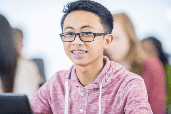 Teen smiling with braces